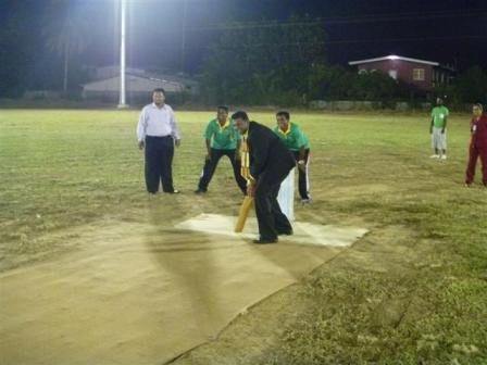 Councillor Allan Seepersad bats under newly installed lights at the Mulchan Seuchan Recreation Ground in Waterloo