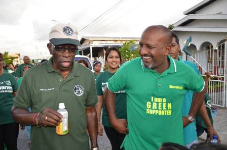 ILP Leader Jack Warner and Mr. Inshan Ishmael on a walkabout for Chaguanas West by-election