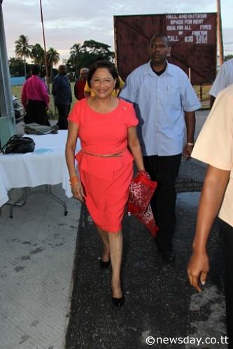 PM ARRIVES: Prime Minister Kamla Persad-Bissessar arrives at UNC Complex, followed by her security, on her way to a UNC National Executive meeting. Author: LINCOLN HOLDER