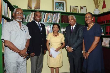 Prime Minister Kamla Persad-Bissessar, SC, centre, meets Haiti's Foreign Minister, Pierre-Richard Casimir, second from left. Others from left, are, Guy Alexandre, of Haiti, Winston Dookeran, Minister of Foreign Affairs of Trinidad and Tobago, and Dr Iva Gloudon, Trinidad and Tobago's High Commissioner to Jamaica. PHOTO COURTESY THE OFFICE OF THE PRIME MINISTER.