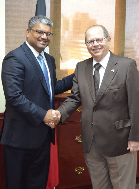 Attorney General Anand Ramlogan SC and  Canadian High Commissioner Gerard Latulippe 