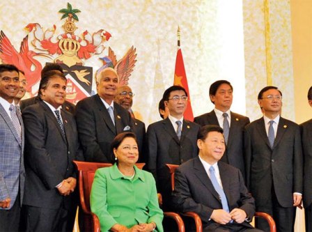 The Prime Minister of Trinidad and Tobago Kamla Persad-Bissessar with Xi Jinping, the president of China.