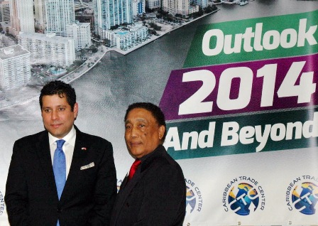   H.E. Dr. Neil Parsan (left) with Michael Mathews (right), President of the Caribbean Trade Center