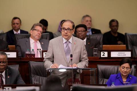 The Minister of Finance and the Economy, Sen. the Hon. Larry Howai reads the Appropriation (Financial Year 2015) Bill, 2014 during the 3rd Sitting of the House of Representatives on Monday 8th September, 2014. Photo Courtesy: Office the Parliament. 