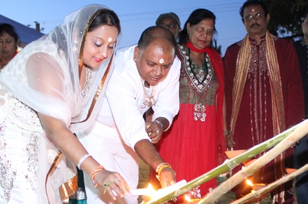 Couva North MP, Ramona Ramdial (2nd from left) and Councillor Dubraj Persad (3rd from left) light the first Diyas at the Couva North Divali Celebration