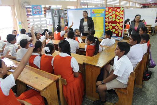 Couva North MP Ramona Ramdial (front left) answers questions from students of the Freeport Hindu Primary School