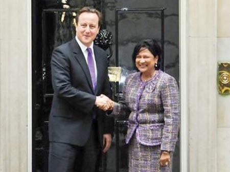 Prime Minister Kamla Persad-Bissessar with her British counterpart, David Cameron, at 10 Downing Street