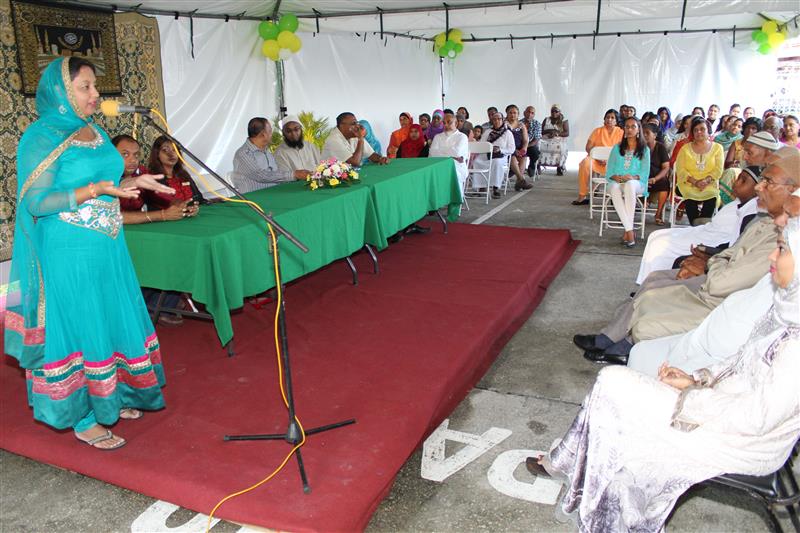Minister Ramona Ramdial (left) addresses guests at her Eid ul Fitr Celebration