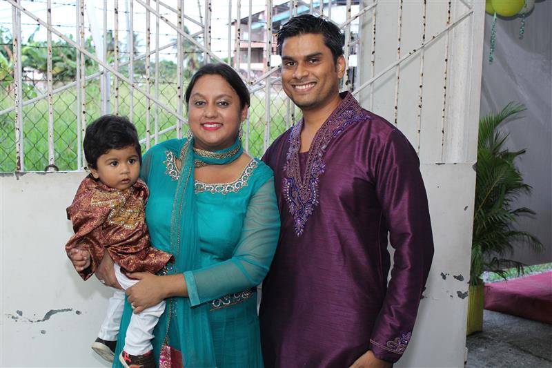 Minister Ramona Ramdial poses with her husband, Devindra Barrath and son, Rudra at her Eid ul Fitr Celebration